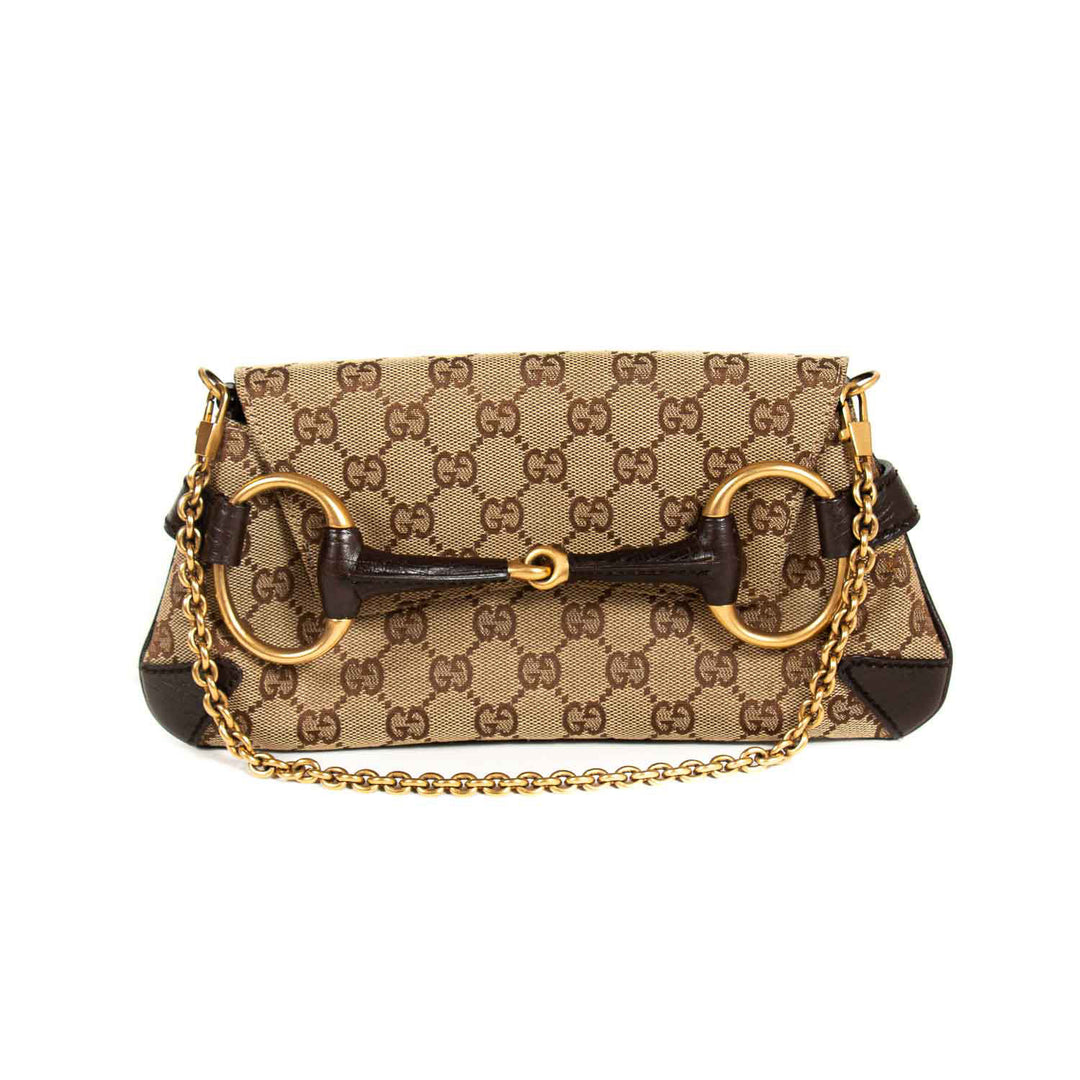 Gucci GG Canvas Horsebit Clutch Bags Gucci - Shop authentic new pre-owned designer brands online at Re-Vogue