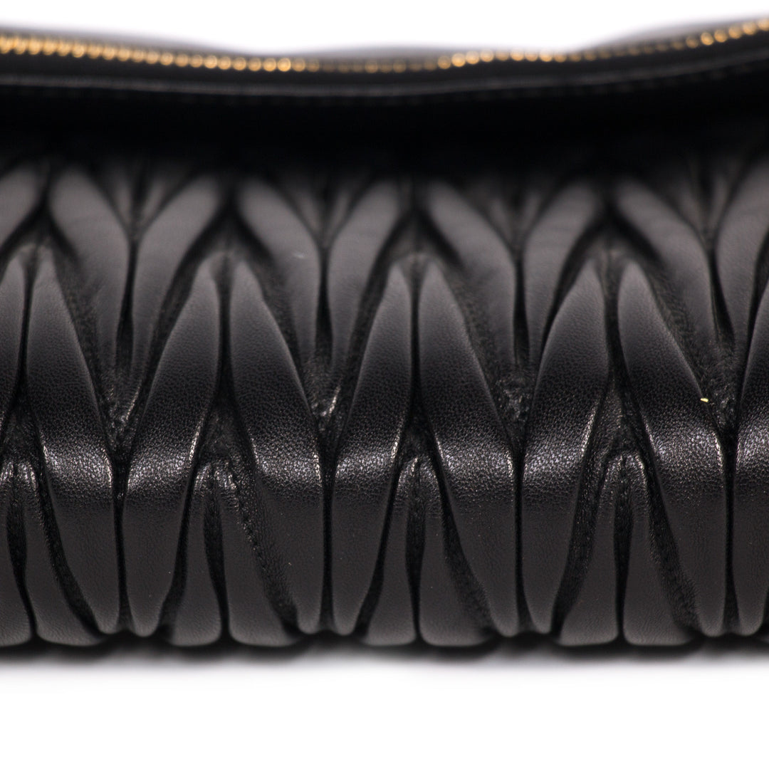 Miu Miu Matelassé Pochette Bags Miu Miu - Shop authentic new pre-owned designer brands online at Re-Vogue